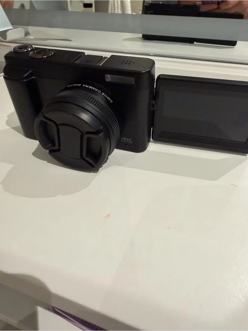 Compact Black Digital Camera with Flip Screen